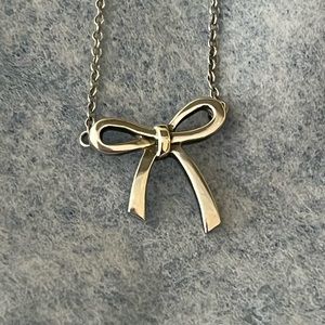 Tiffany&Co retired ribbon/bow necklace in sterling silver.